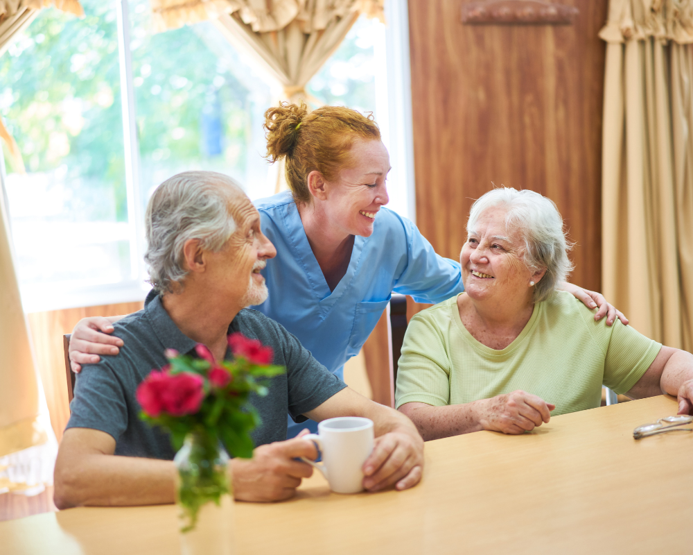 Faithful Touch caregivers with clients around a table
