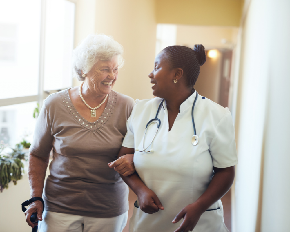 Caregiver supporting a client recovering after surgery